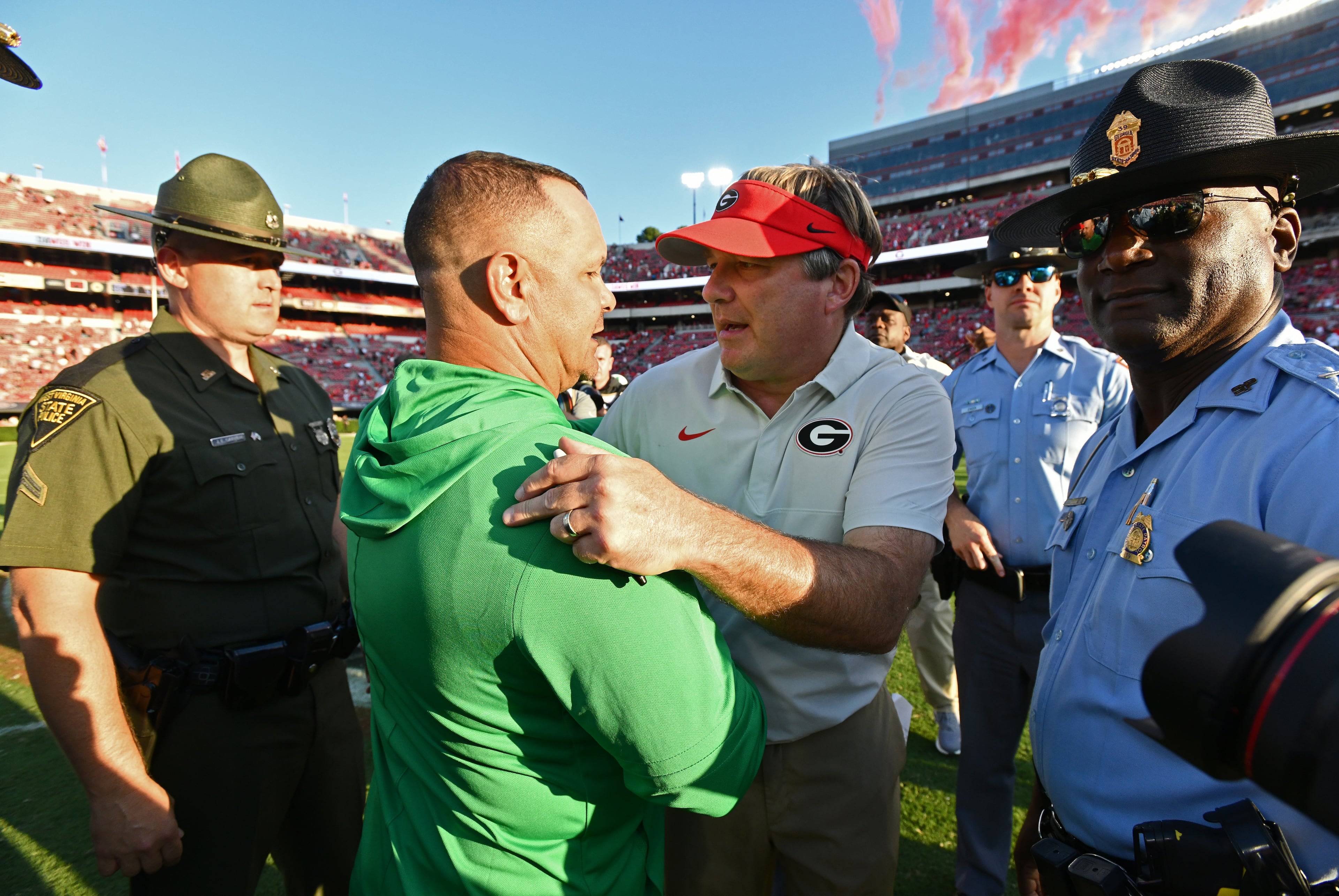 Georgia head coach Kirby Smart talks to Marshall head coach Tony Gibson after Georgia beat Marshall during an NCAA football game at Sanford Stadium, Saturday, August 30, 2025, in Athens. Georgia won 45-7 overMarshall. (Hyosub Shin / AJC)