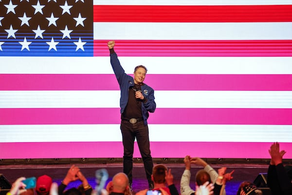 Elon Musk speaks at a town hall Sunday, March 30, 2025, in Green Bay, Wis. (AP Photo/Jeffrey Phelps)