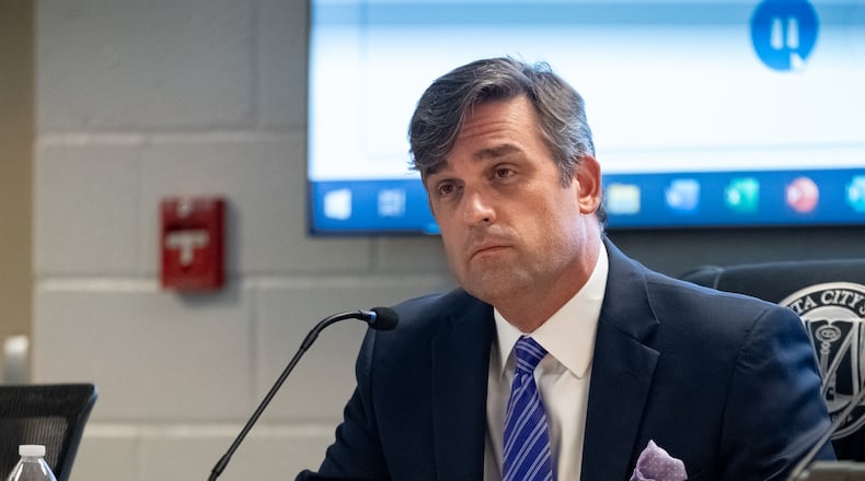 Marietta City Schools Superintendent Grant Rivera listens to public comment during the school board's meeting on June 18, 2024. The board unanimously passed a ban on cellphones and smartwatches for middle school students during the school day. (Ben Hendren for The Atlanta Journal-Constitution)