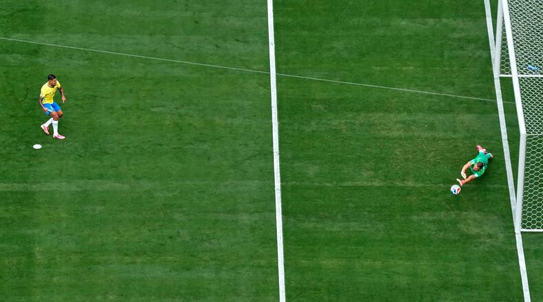 Norway goalkeeper Oerjan Nyland (1) saves a penalty from Brazil's Bruno Guimaraes (8) during the World Cup round of 16 soccer match between Brazil and Norway in East Rutherford, N.J., near New York, Sunday, July 5, 2026. (AP Photo/Stephen K.H. Moyes)