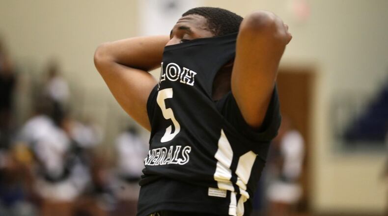 Shiloh guard James Little reacts after his Generals, ranked No. 2 in Class AAAAAAA, lost in overtime Thursday night at Wheeler in the second round of the boys state tournament. (Jason Getz/Special to the AJC)