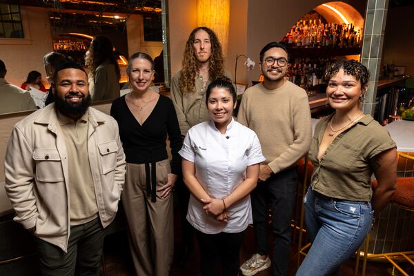 (L-R) Restaurant team Artie De Los Santos, Rosa Thurnher, Dallas Dawson, Claudia Martinez, Ivan Solis, and Mayim Williams pose at Bar Ana in Atlanta on Thursday, December 4, 2025. (Arvin Temkar/AJC)