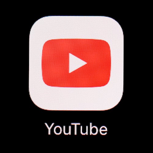 FILE - The YouTube app is displayed on an iPad in Baltimore on March 20, 2018. (AP Photo/Patrick Semansky, File)