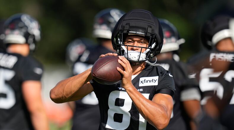 Houston Texans wide receiver Jayden Higgins works out during the team's NFL football training camp in Houston, Wednesday, July 29, 2026. (AP Photo/Ashley Landis)