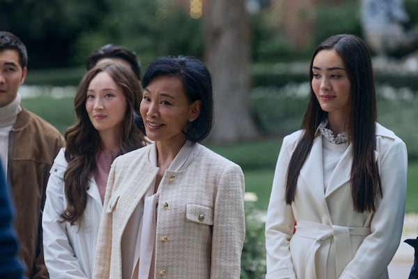 Joan Chen (center) plays the rival matriarch across the street from the Clausters home in "Oh. What. Fun." (Alisha Wetherill/Courtesy of Amazon Studios)