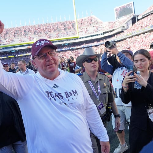 Texas A&M head coach Mike Elko celebrates after an NCAA college football game against South Carolina Saturday, Nov. 15, 2025, in College Station, Texas. (AP Photo/David J. Phillip)