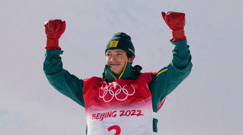 FILE - Silver medal winner Australia's Scotty James celebrates during the venue award ceremony for the men's halfpipe finals at the 2022 Winter Olympics, Feb. 11, 2022, in Zhangjiakou, China. (AP Photo/Francisco Seco, File)