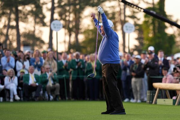 Honorary Starter Jack Nicklaus acknowledges the patrons after his shot on the first hole during the first round at the Masters golf tournament, Thursday, April 10, 2025, in Augusta, Ga. (AP Photo/Matt Slocum)