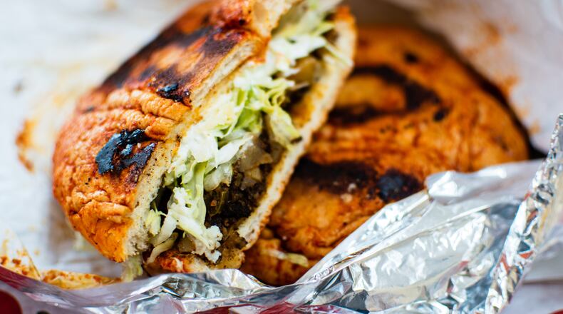 The potato and chorizo pambazo from Tortas Factory del D.F. on Buford Highway is delightfully messy.