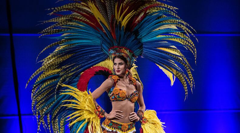 Miss Colombia Gabriela Tafur Nader showcases her costume that represents her country at the Miss Universe Pageant National Costume Show in Atlanta on Friday, Dec. 6, 2019. PHOTO BY ELISSA BENZIE/FOR THE AJC
