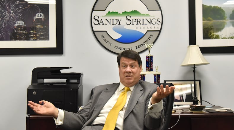 Mayor Rusty Paul ran unopposed and was re-elected to a second term in Sandy Springs, but the city will welcome two new members to its city council after Tuesday’s election.