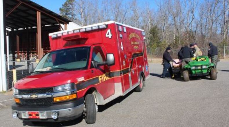 Cherokee County fire officials transport a man who had been missing.