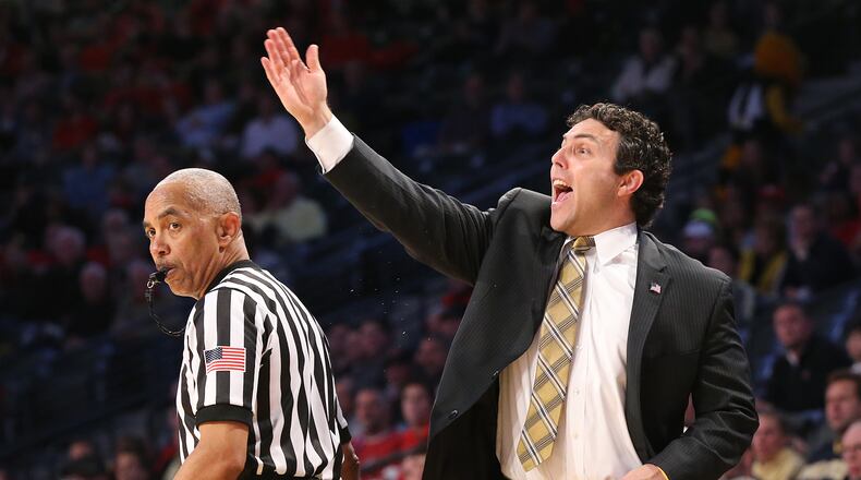 Georgia Tech coach Josh Pastner directs his offense during Tuesday's game against Georgia.