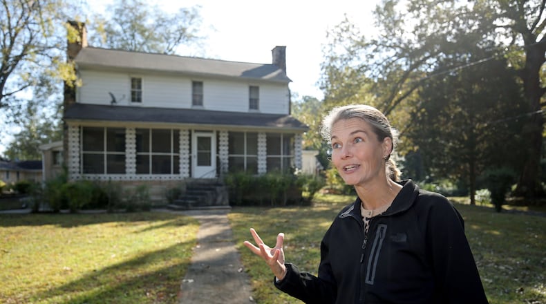 October 31, 2018 - Snellville, Ga: Gwinnett County Community Services Natural and Cultural Resources Manager Catherine Long tours the Maguire-Livsey Big Home Wednesday, October 31, 2018, in Snellville, Ga. This home also known as the “Big House” was recently purchased by Gwinnett County for renovation and preservation from descendants of the original black owners. (JASON GETZ/SPECIAL TO THE AJC)