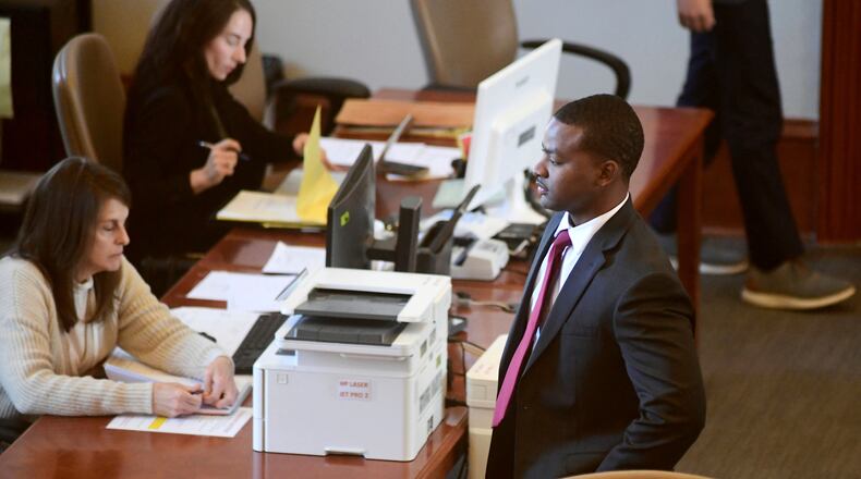FILE - Sheldon Timothy Herrington Jr., who is on trial on a capital murder charge in the 2022 death of University of Mississippi student Jimmie "Jay" Lee, looks out into the courtroom during the lunch break, in Oxford, Miss., on Dec. 3, 2024. (Bruce Newman/The Northeast Mississippi Daily Journal via AP, Pool, File)