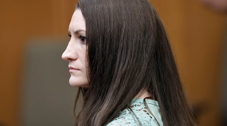 Lindsay Clancy watches jurors as they enter the courtroom to start their second day of deliberations in her murder trial at Plymouth Superior Court on Friday, Aug. 28, 2026 in Plymouth Mass. (Greg Derr/The Patriot Ledger via AP, Pool)
