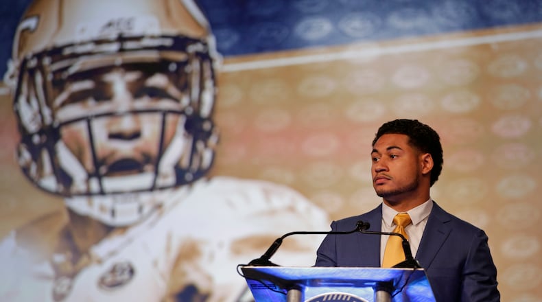 Georgia Tech's Justin Thomas answers a question during a news conference at the Atlantic Coast Conference Football Kickoff in Charlotte, N.C., Thursday, July 21, 2016. (AP Photo/Chuck Burton)