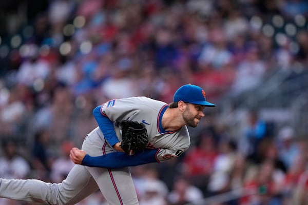 New York Mets pitcher David Peterson (23) delivers in the first inning of a baseball game against the Atlanta Braves, Tuesday, June 17, 2025, in Atlanta. (AP Photo/Brynn Anderson)