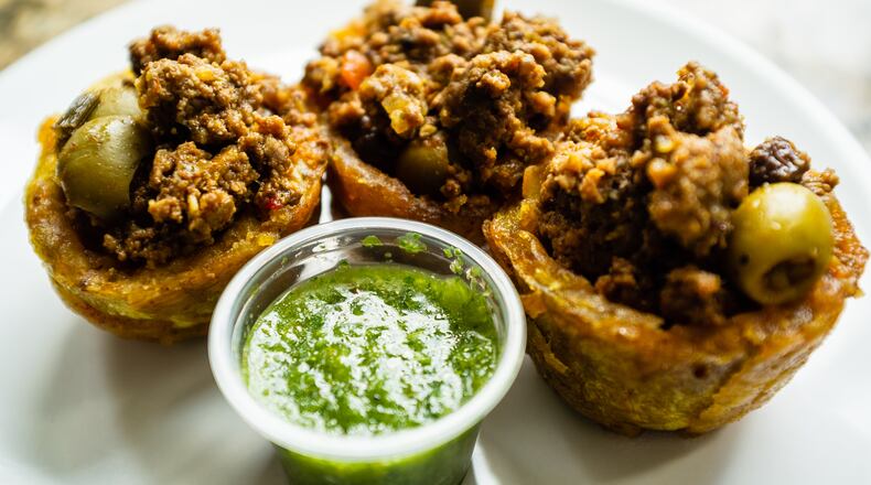 2 Sistas Soul Food sells tostones rellenos, adorable little cups of fried plantain filled with meat and served with a fresh cilantro-garlic sauce.