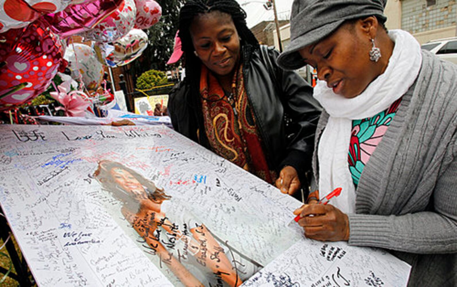 Fans mourn the loss of Whitney Houston