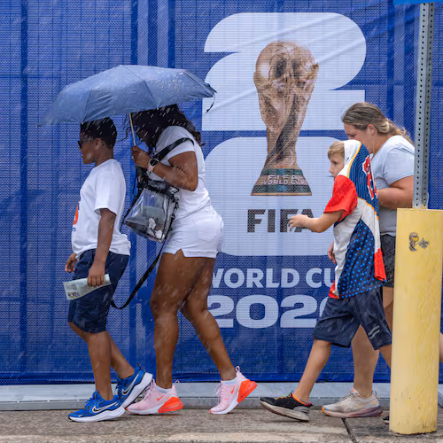 Soccer fans walk in the rain to Atlanta Stadium for the South Africa vs. Czechia match on Thursday, June 18, 2026. (Ben Hendren for the AJC)