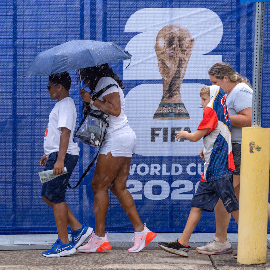 Soccer fans walk in the rain to Atlanta Stadium for the South Africa vs. Czechia match on Thursday, June 18, 2026. (Ben Hendren for the AJC)