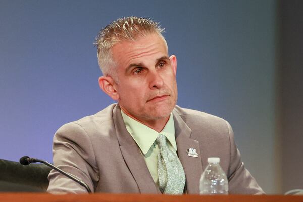 DeKalb County interim Superintendent Norman Sauce listens during the public comment portion of a DeKalb County School Board meeting on Monday, April 20, 2026, in Stone Mountain. (Jason Getz/AJC)