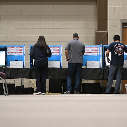 Gwinnett County voters cast their ballots on Election Day at Gracepointe Church of the Nazarene in Loganville in 2024. (Hyosub Shin/AJC)