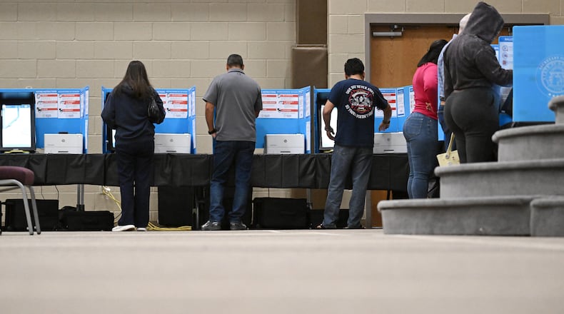 Gwinnett County voters cast their ballots on Election Day at Gracepointe Church of the Nazarene in Loganville in 2024. (Hyosub Shin/AJC)