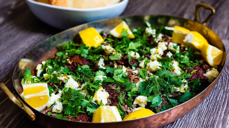 Seared lamb with halloumi and herbs. CONTRIBUTED BY HENRI HOLLIS