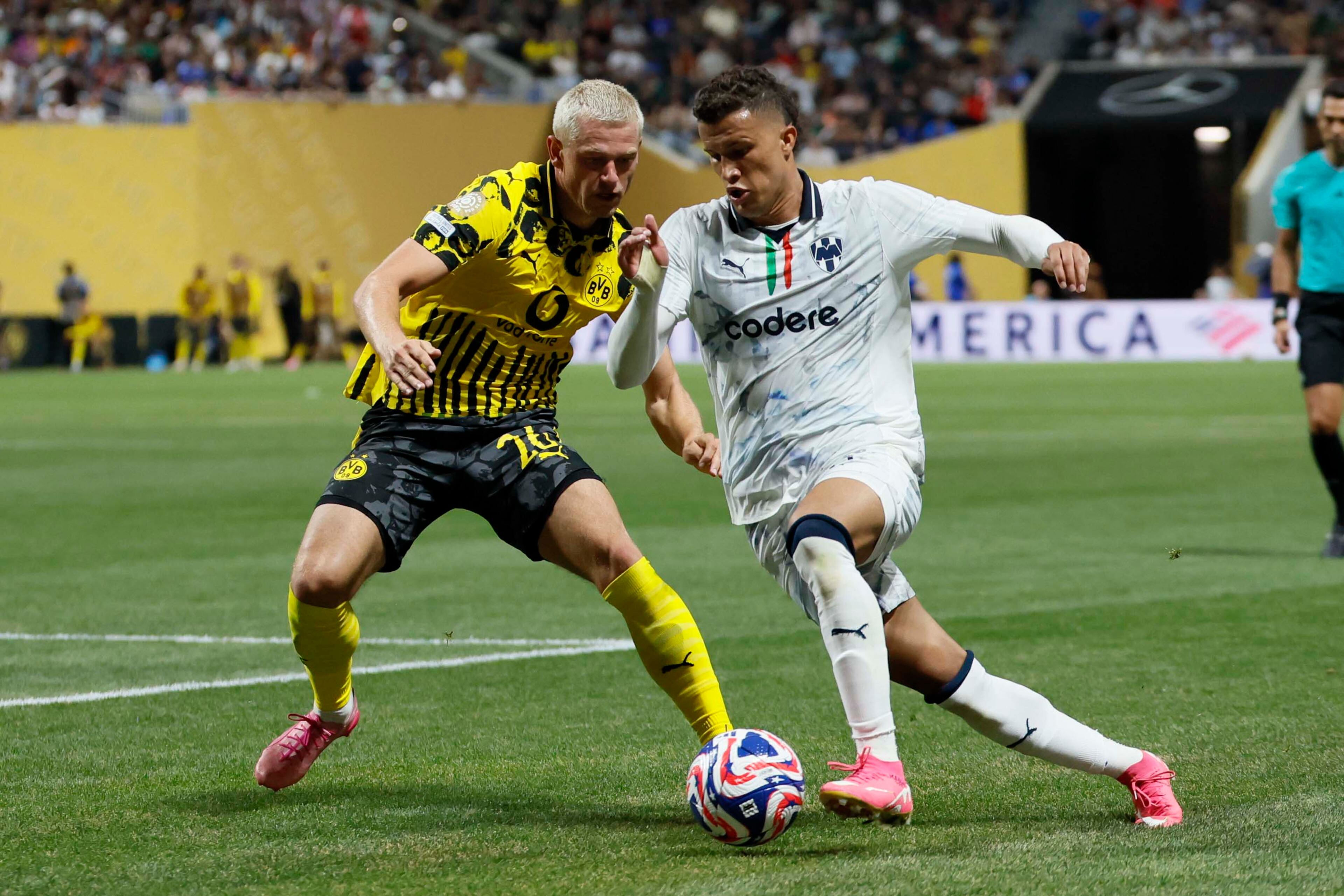 Monterrey defender Edson Gutiérrez (6) dribbles against Borussia Dortmund defender Julian Ryerson (26) during the Club World Cup round of 16 soccer match between Borussia Dortmund and C.F. Monterrey in Atlanta, Georgia, on Tuesday, July 1, 2025.
(Miguel Martinez/ AJC)