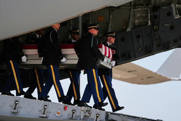 A U.S. Army carry team moves a transfer case containing 1st Lt. Tyler James Feehan on Wednesday, July 22, 2026, at Dover Air Force Base, Delaware. (Matt Rourke/AP)