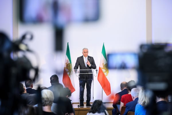 Reza Pahlavi, the son of Iran's toppled Shah Mohammad Reza Pahlavi, speaks during a press conference, Monday, June 23, 2025 in Paris. (AP Photo/Thomas Padilla)