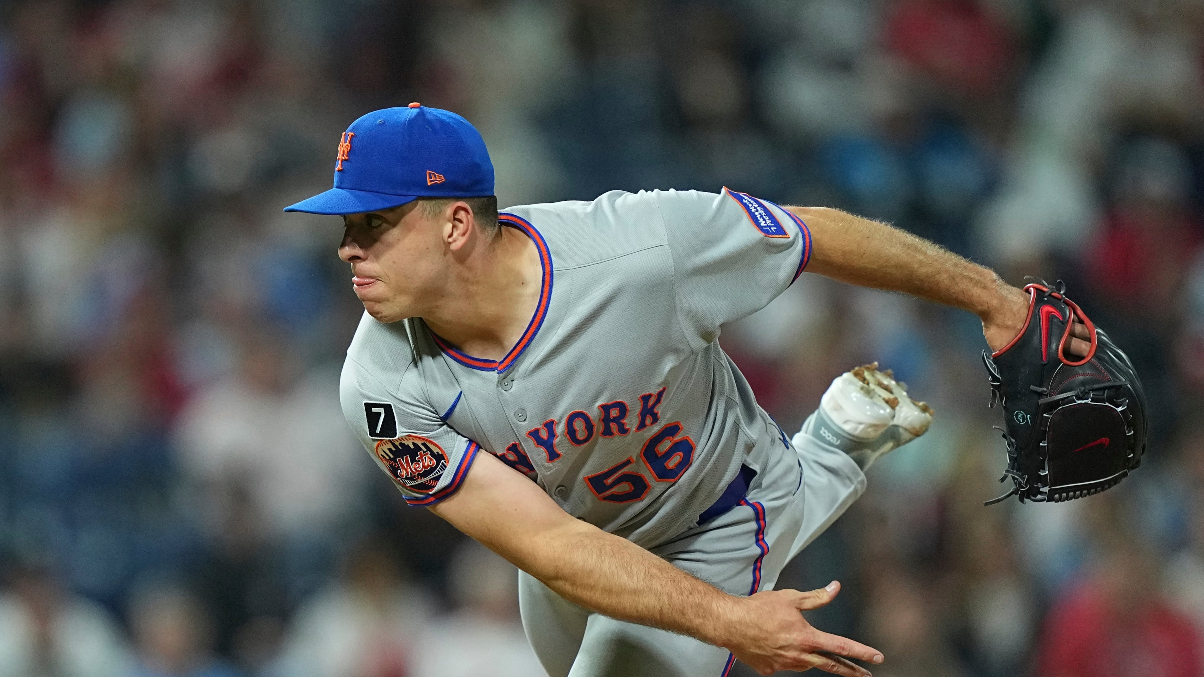 FILE - New York Mets pitcher Ryan Helsley throws during the eighth inning of a baseball game Sept. 10, 2025, in Philadelphia. (AP Photo/Matt Rourke, File)