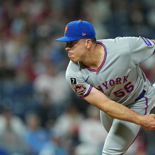 FILE - New York Mets pitcher Ryan Helsley throws during the eighth inning of a baseball game Sept. 10, 2025, in Philadelphia. (AP Photo/Matt Rourke, File)