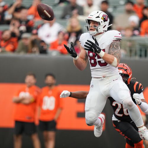 FILE - Arizona Cardinals tight end Trey McBride (85) catches a touchdown pass in the end zone during the second half of an NFL football game against the Cincinnati Bengals, Dec. 28, 2025, in Cincinnati. (AP Photo/Joshua A. Bickel, File)