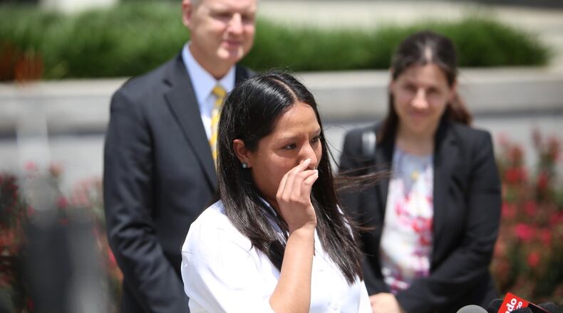 Former Kennesaw State University student Jessica Colotl speaks outside the federal courthouse Thursday. Miguel Martinez/MundoHispanico