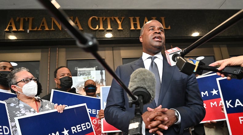 August 17, 2021 Atlanta - Former Atlanta mayor Kasim Reed speaks to members of the press after filing paperworks for November 2nd Atlanta Mayoral Election outside the Atlanta City Hall on Tuesday, August 17, 2021. Atlanta City Council President Felicia Moore and former Atlanta mayor Kasim Reed filed paperwork and qualified as a candidate in the November 2nd Atlanta Mayoral Election. (Hyosub Shin / Hyosub.Shin@ajc.com)