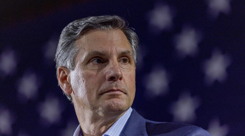 Derek Dooley, a Republican candidate for Senate in Georgia, listens to Georgia Gov. Brian Kemp, not pictured, speak during an Atlanta Young Republicans campaign event Thursday, Feb. 12, 2026, in Atlanta. (Alyssa Pointer/AP)