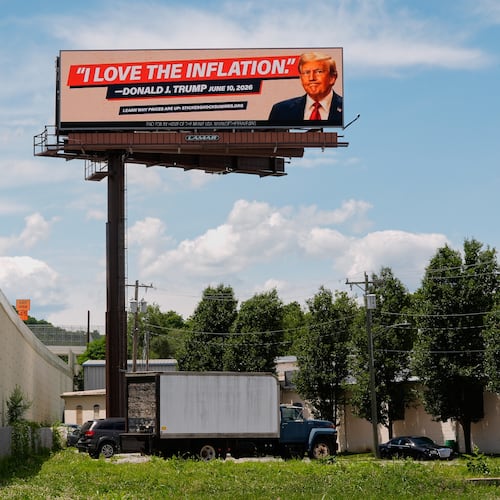 An electronic billboard that reads "I love the inflation." - Donald J. Trump June 10, 2026," is seen near I-74 in Cincinnati, Tuesday, June 16, 2026. (AP Photo/Carolyn Kaster)