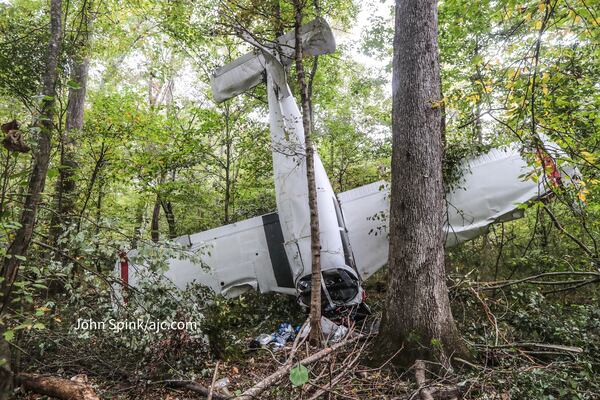Two women were aboard a small plane that crashed into a wooded area off Tara Beach Lane late Tuesday night.