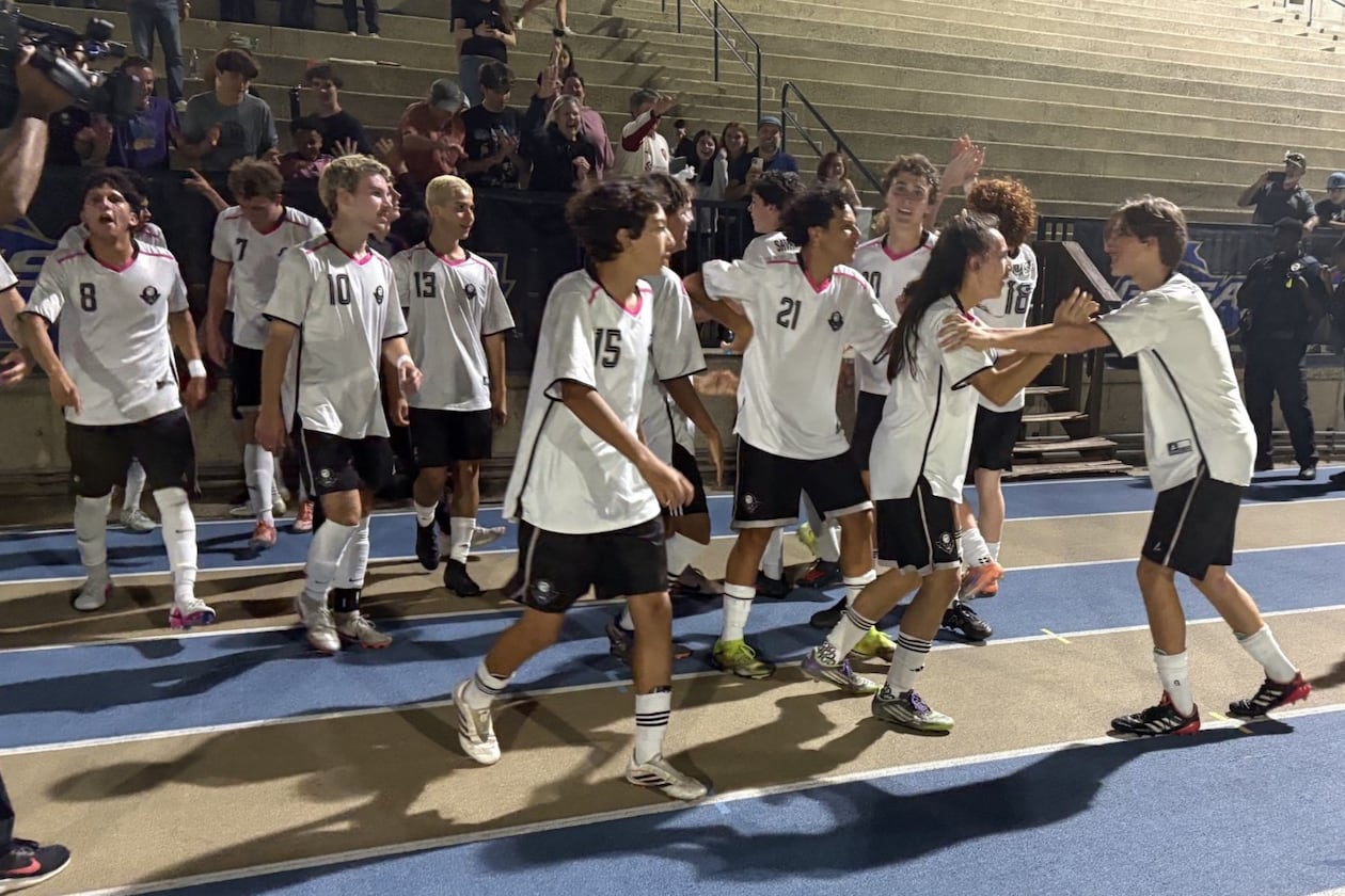 Savannah Arts Academy players celebrate in front of their fans after defeating Pierce County 2-0 in the Class 2A boys soccer championship on May 13, 2026, at St. Pius X High School in Atlanta.