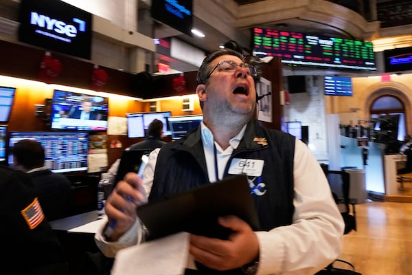Trader Michael Capolino works on the floor of the New York Stock Exchange, Thursday, April 24, 2025. (AP Photo/Richard Drew)