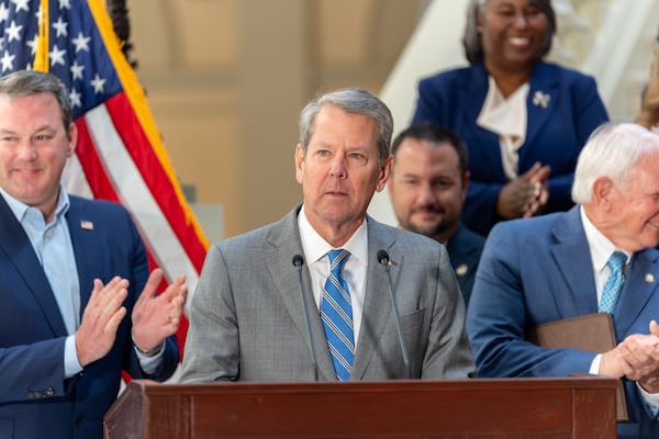 Gov. Brian Kemp speaks before signing multiple pieces of legislation inside the Georgia State Capitol building Monday. (Ben Hendren/AJC)
