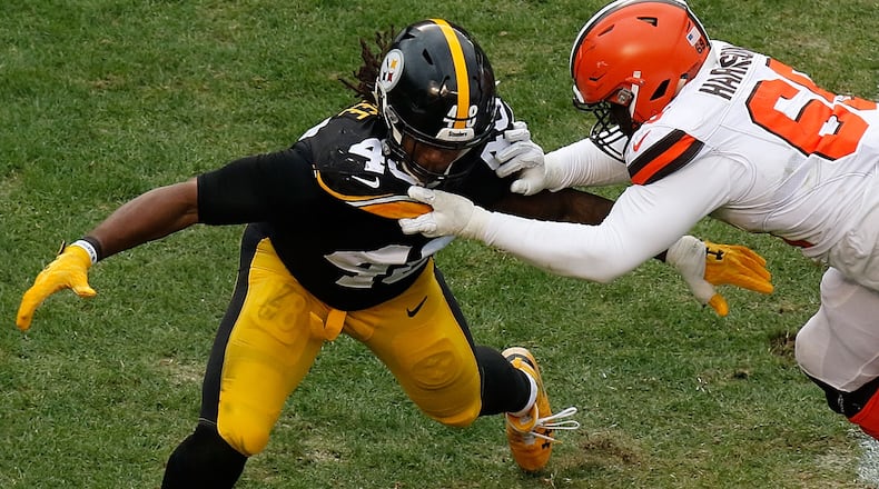 Pittsburgh's Bud Dupree is blocked by Cleveland's Desmond Harrison during the third quarter Oct. 28, 2018, at Heinz Field in Pittsburgh.