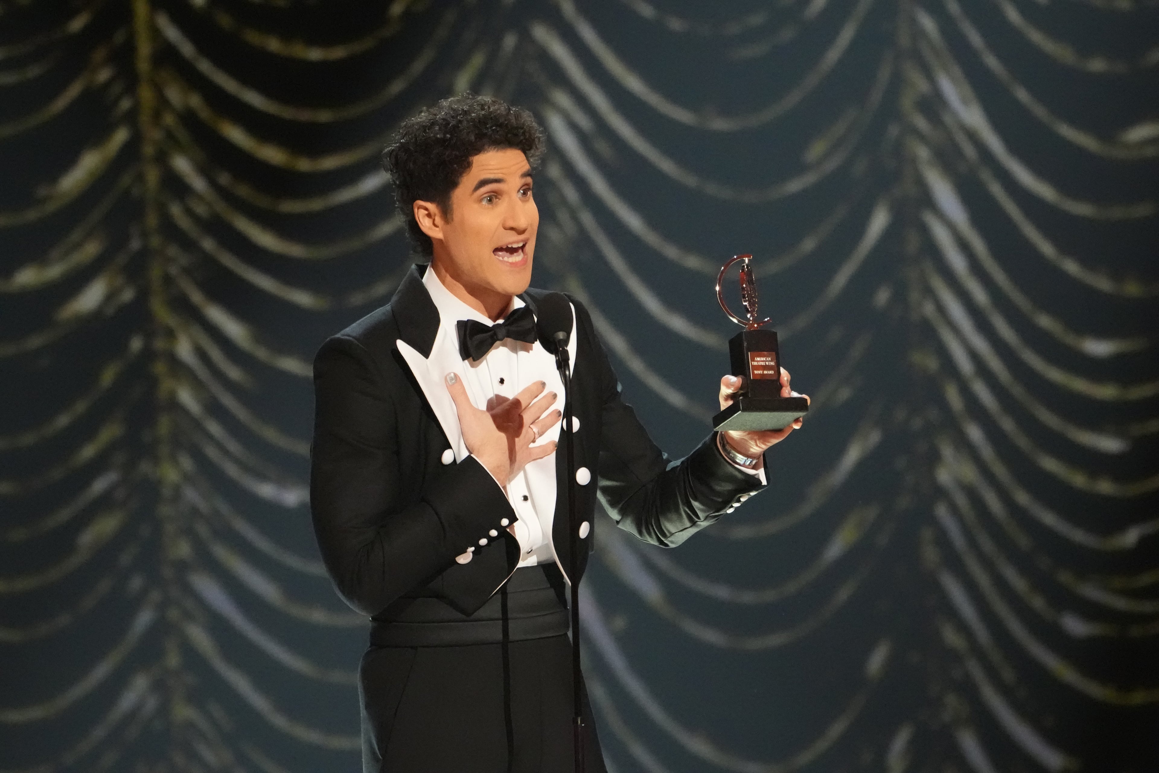 Darren Criss accepts the Tony for best leading actor in a musical for his performance in “Maybe Happy Ending.” (Sara Krulwich/The New York Times)