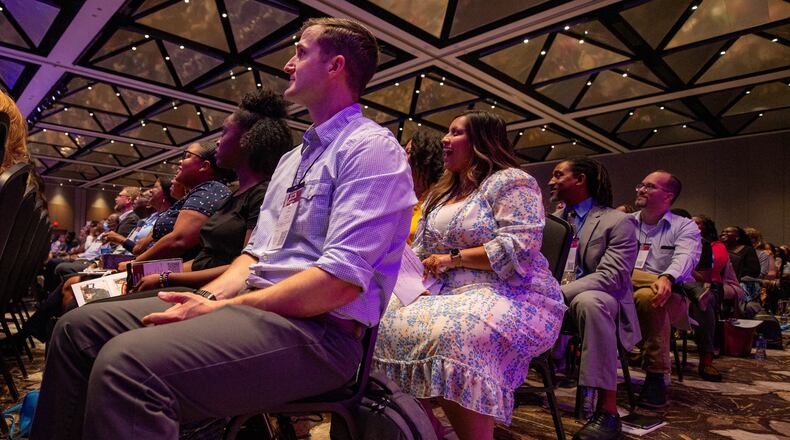 Newly hired Gwinnett County teachers participate in orientation. Teachers in the district now have the opportunity to earn a leadership certificate from Mercer University for free. (Katelyn Myrick / katelyn.myrick@ajc.com)