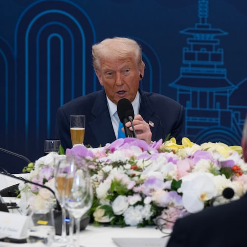 President Donald Trump looks towards Canada Prime Minister Mark Carney as he delivers remarks at a dinner hosted by South Korea President Lee Jae-Myung in Gyeongju, South Korea, Wednesday, Oct 29, 2025. (Adrian Wyld/The Canadian Press via AP)