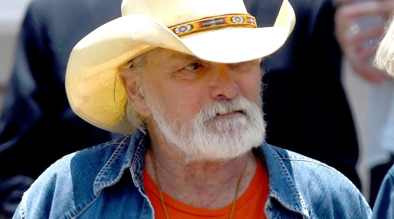 Dickey Betts, a founding member of the Allman Brothers Band, exits the funeral of Gregg Allman at Snow's Memorial Chapel, June 3, 2017, in Macon, Ga. Guitar legend Betts, who co-founded the Allman Brothers Band and wrote their biggest hit, “Ramblin’ Man,” died Thursday, April 18, 2024. He was 80. (Jason Vorhees/The Macon Telegraph via AP, File)