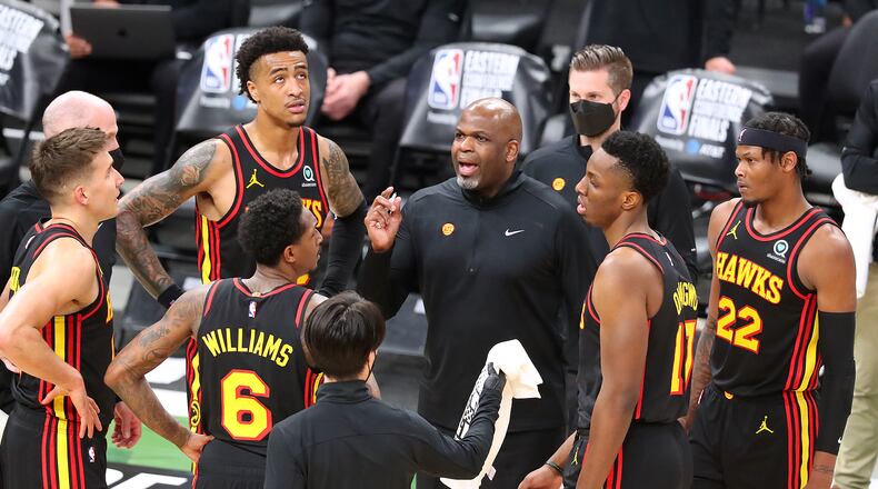 Hawks coach Nate McMillan directs his team. “Curtis Compton / Curtis.Compton@ajc.com”